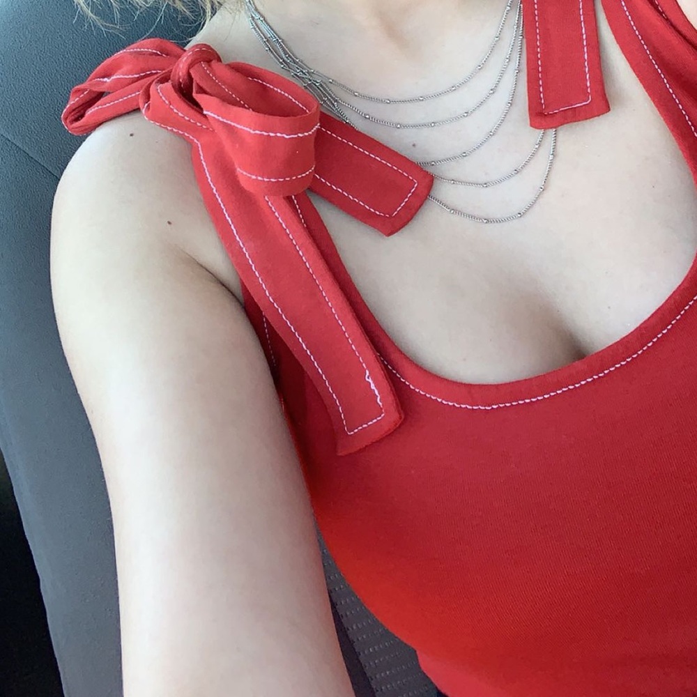 Red bow bodysuit